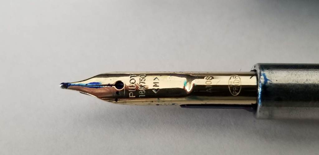 18 kt gold Medium NIB writes like butter! Same with the Rhodium nib!